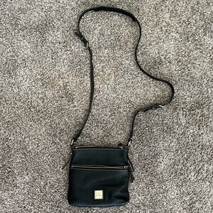 Dooney & Bourke black Crossbody bag adjustable strap front pocket